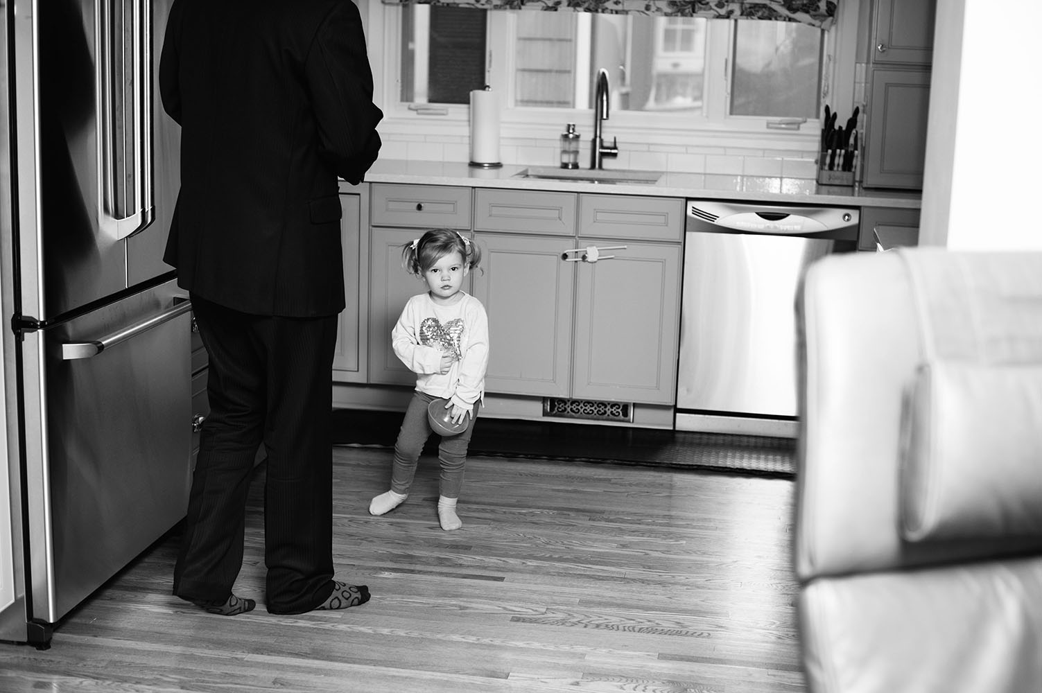 little girl in kitchen