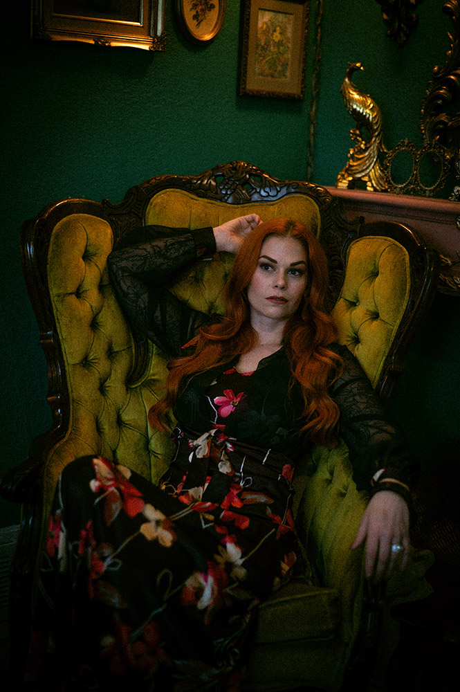woman in a green chair