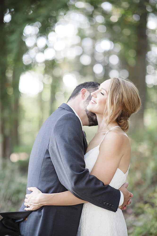 married couple embrace at Theodore Wirth