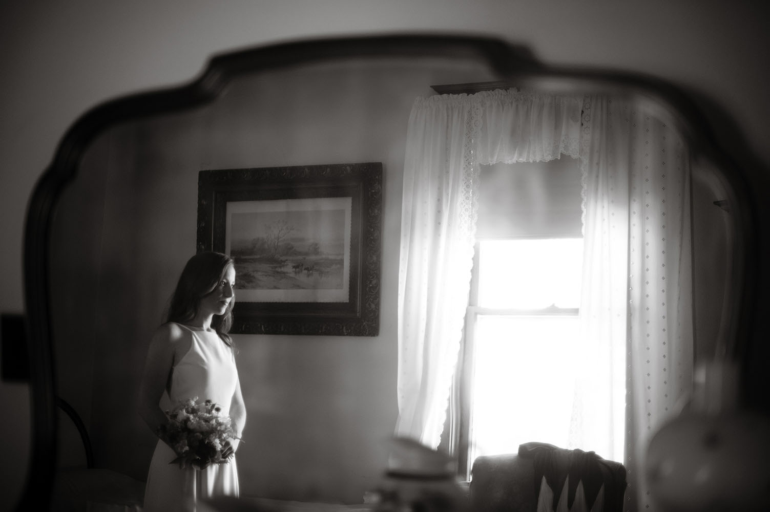 bride reflection in mirror black and white