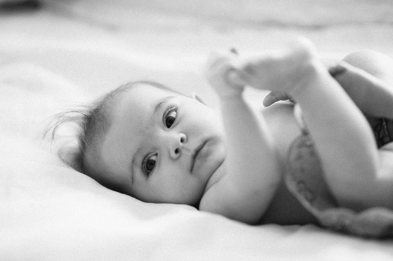 black and white photo of baby