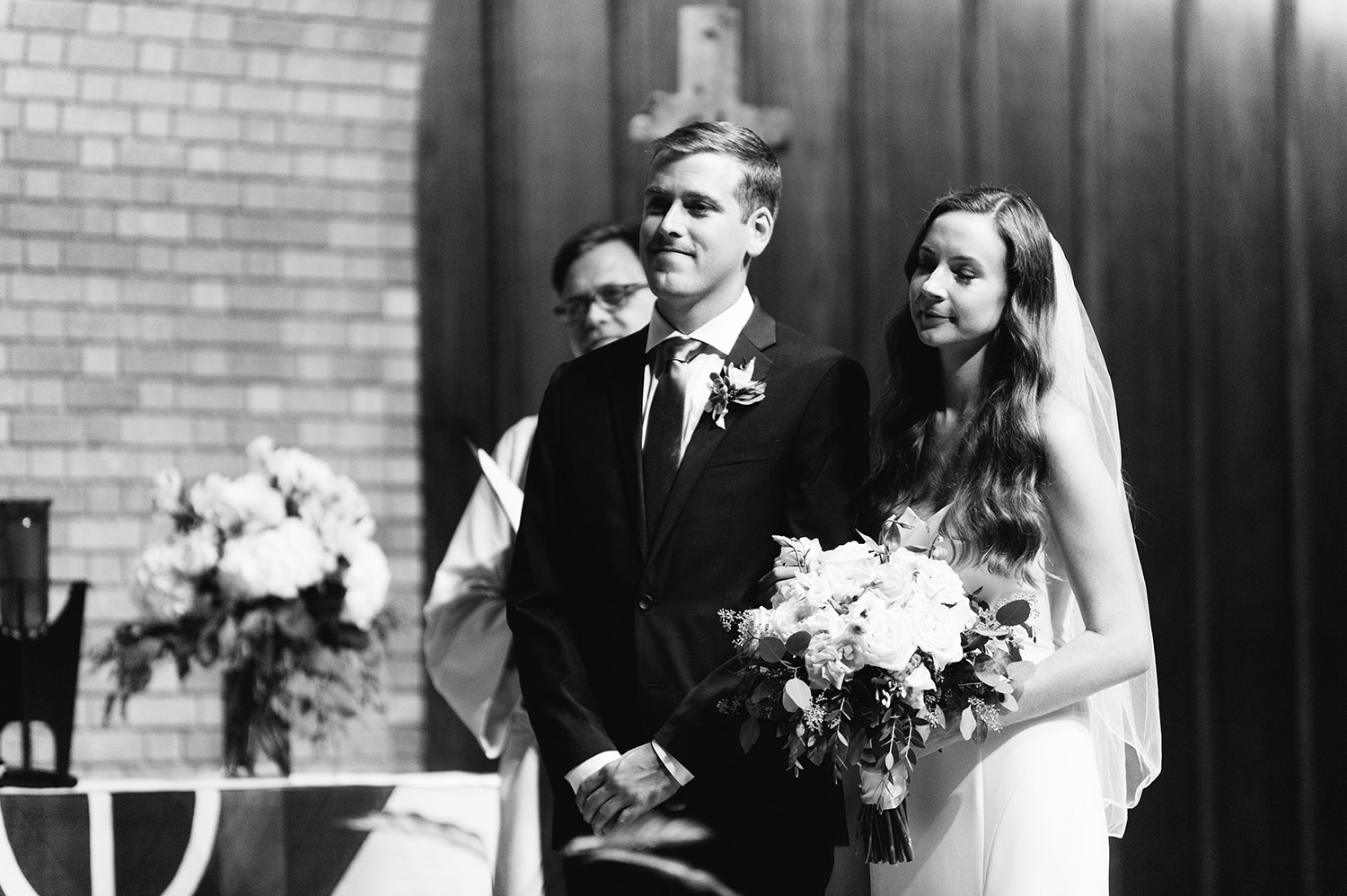 bride and groom getting married in a church