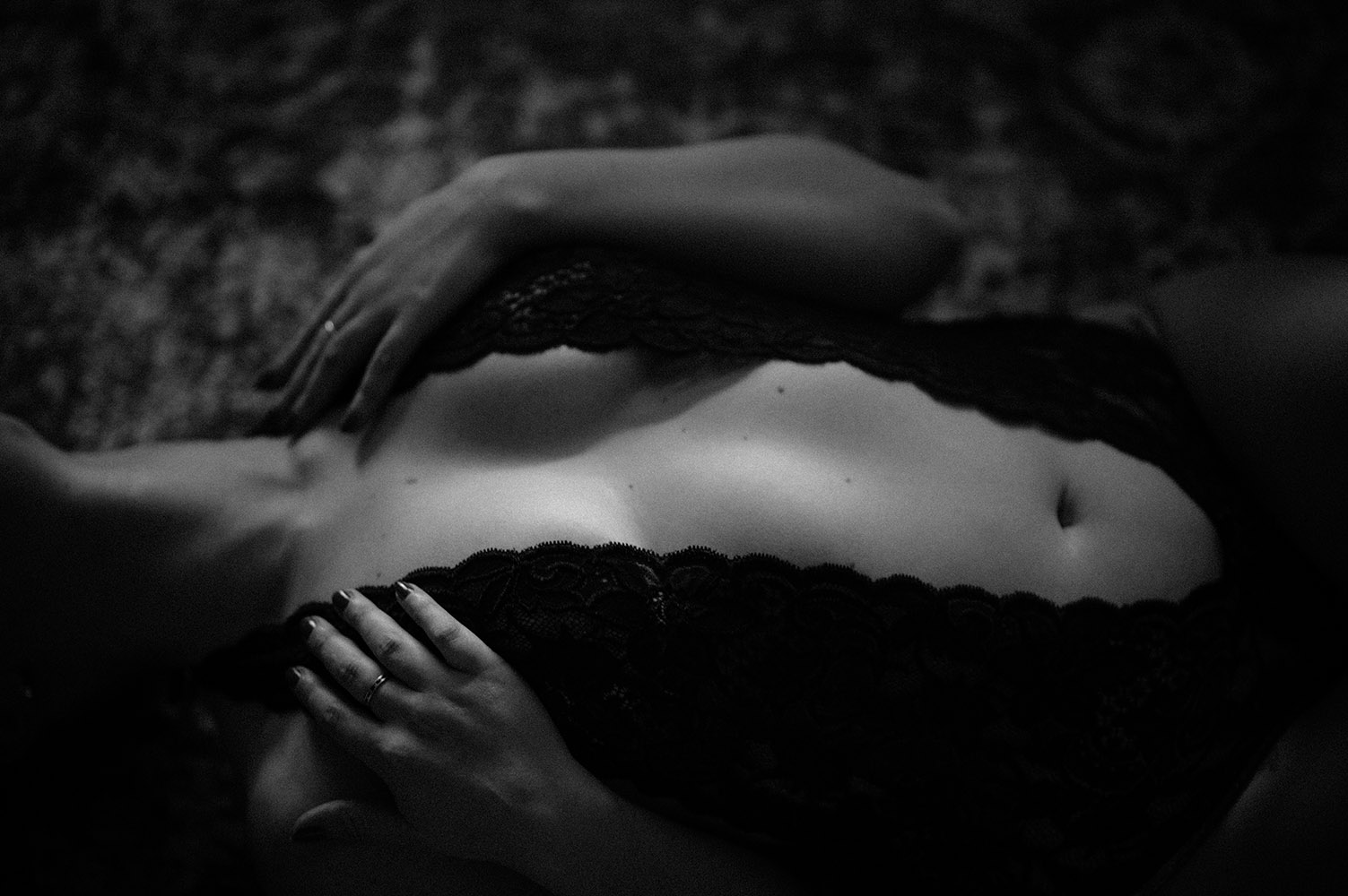 black and white boudoir womans chest