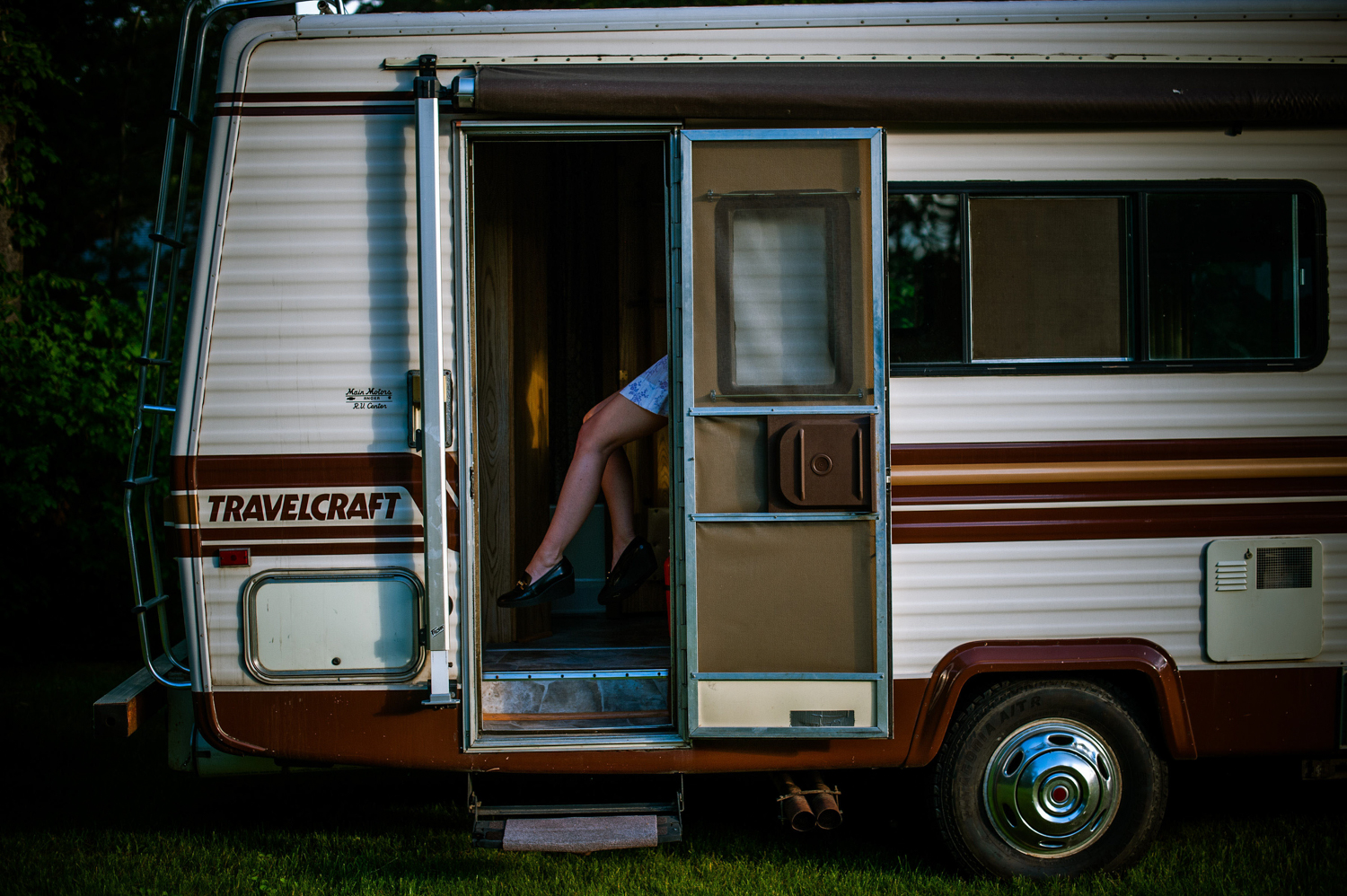 a womans legs in an RV door