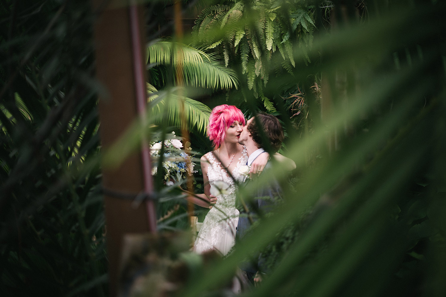 bride with pink hair and groom at MN arboretum