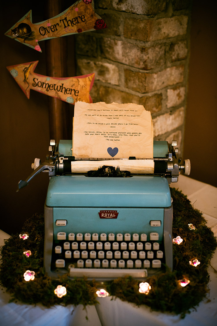 blue typewritter with wedding message typed on it