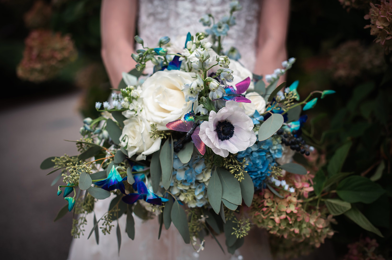 wedding bouquet with butterflies and anemonies